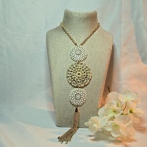 Intricate Silver Necklace with Cascading Pendant and Tassel